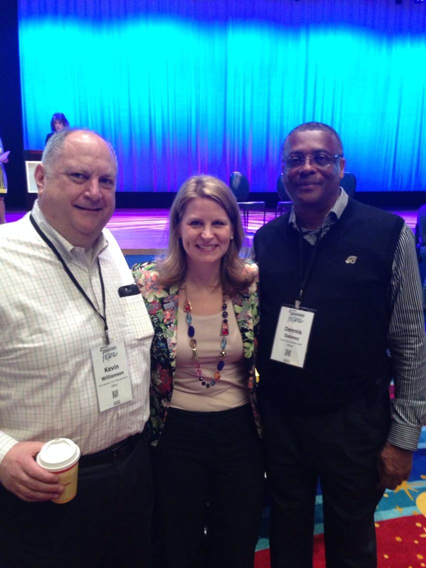 Dennis Dabney with two attendees at an event